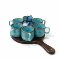 Elegant Diwali gift hamper with 6 sky-blue ceramic cups, wooden tray, and scented candle—perfect festive luxury for family and friends. Dailyalley