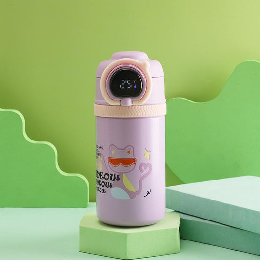 Pink thermos bottle with digital display on a green background