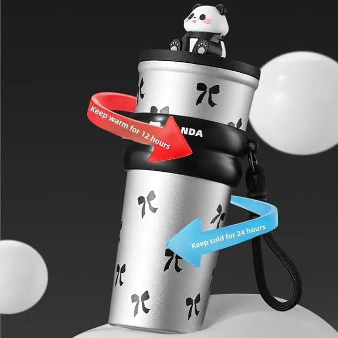 Silver cup with panda design and text on a black background