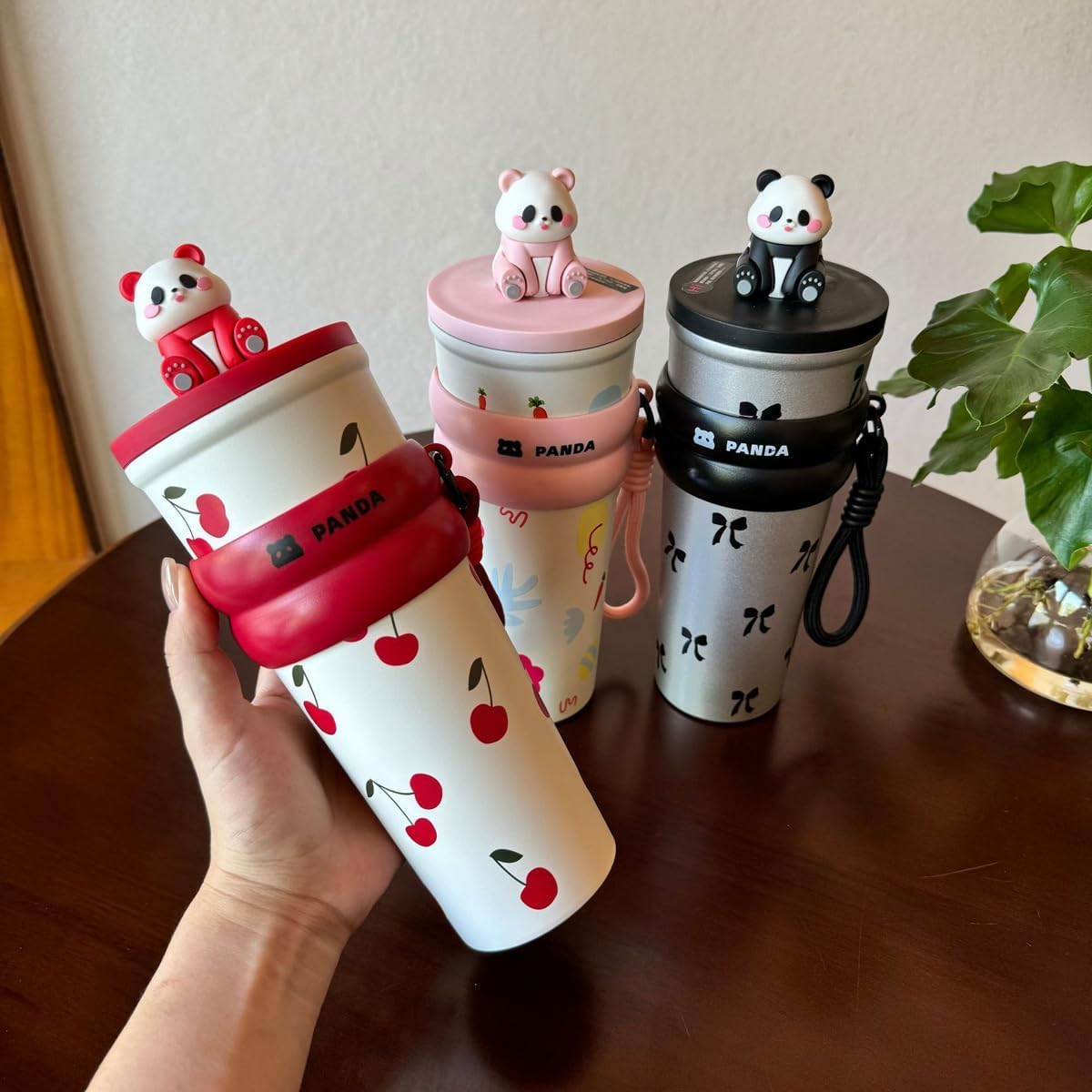 DailyAlley Black Panda Water Bottle - A cute, cherry-designed water bottle perfect for staying hydrated with a touch of fun and style.