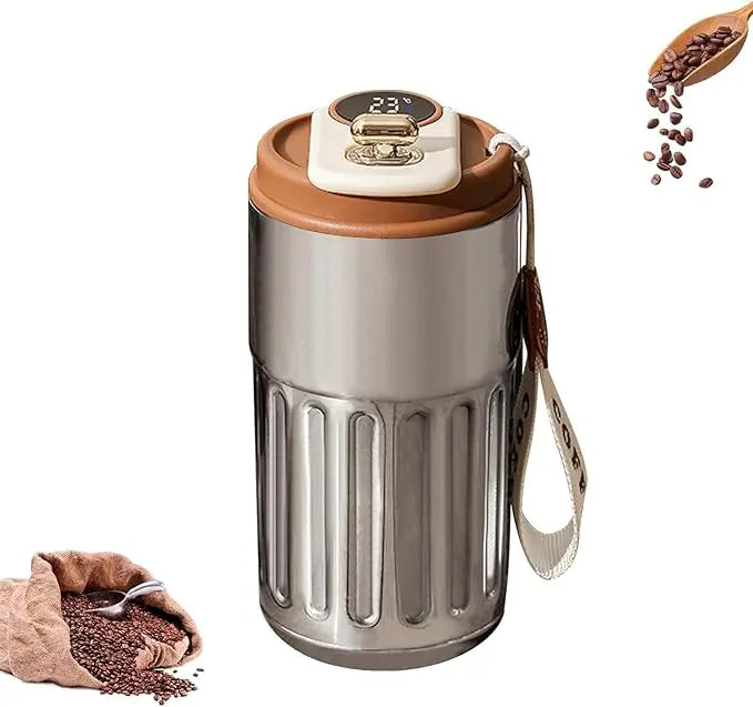 Coffee grinder with a digital display, surrounded by coffee beans and a wooden spoon on a white background.
