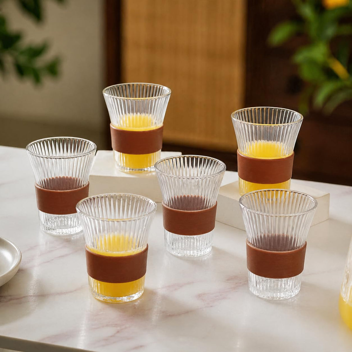 DailyAlley 6-Piece Glass Set - A premium set of six glasses with a stylish wooden grip, perfect for serving drinks with a touch of elegance.