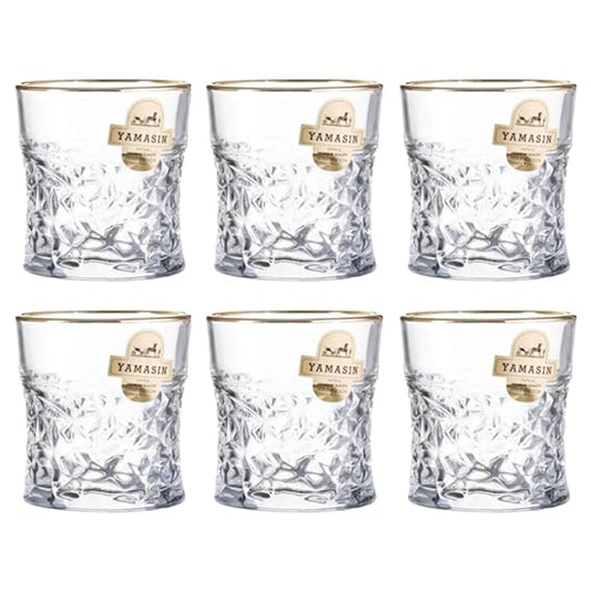 Set of six crystal glasses  on a white background