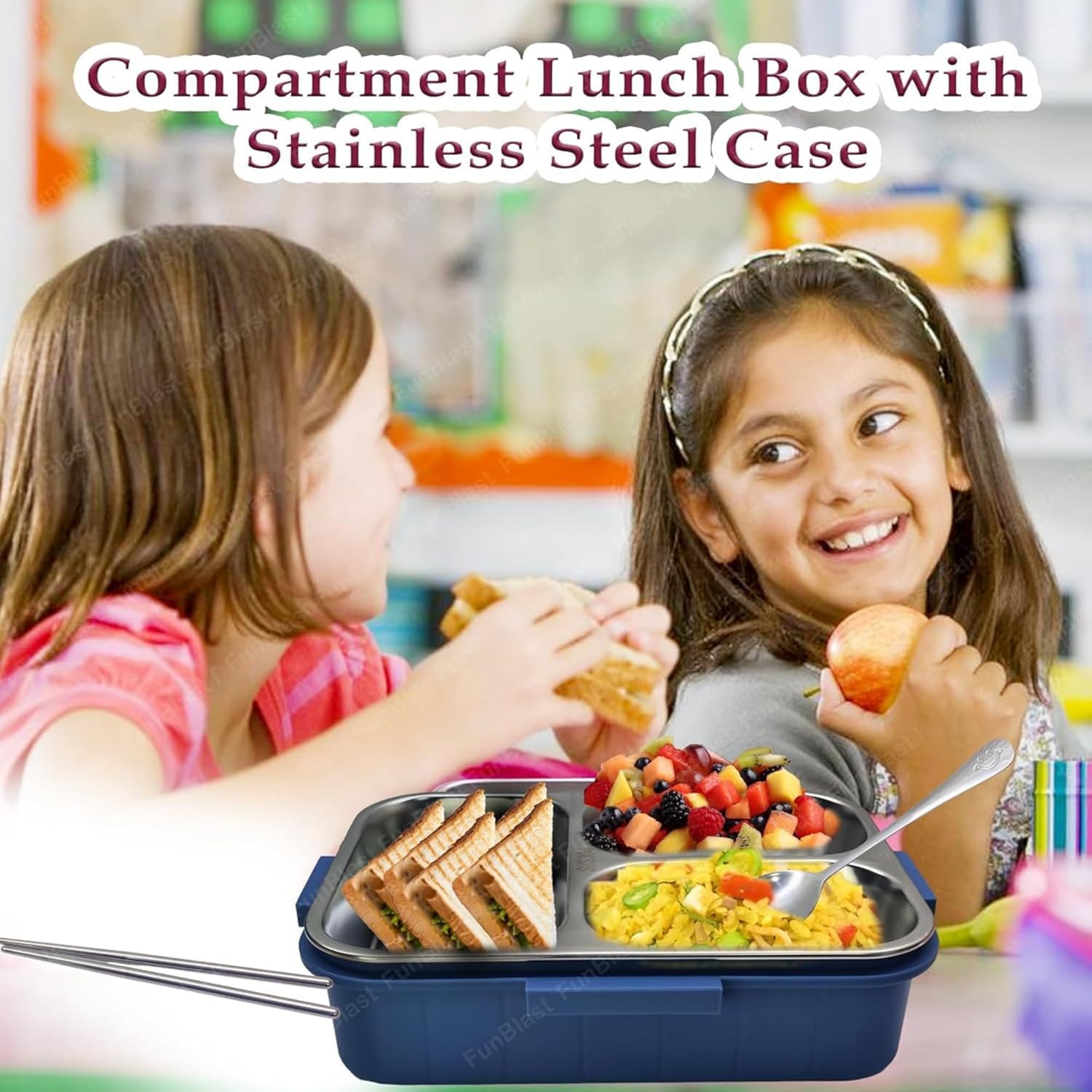 Two children with a compartment lunch box containing food in a classroom setting.