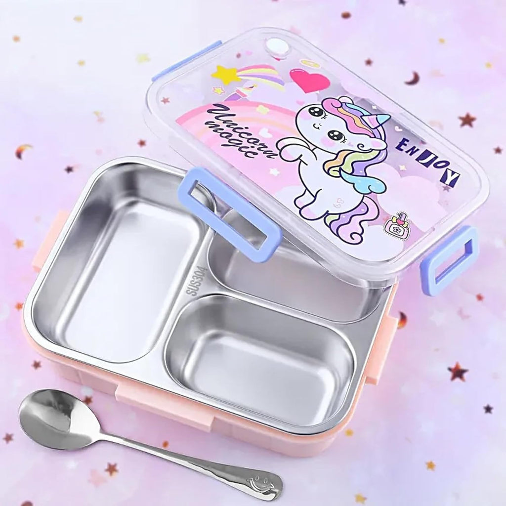 Stainless steel bento box with unicorn design on lid, spoon, and pink background