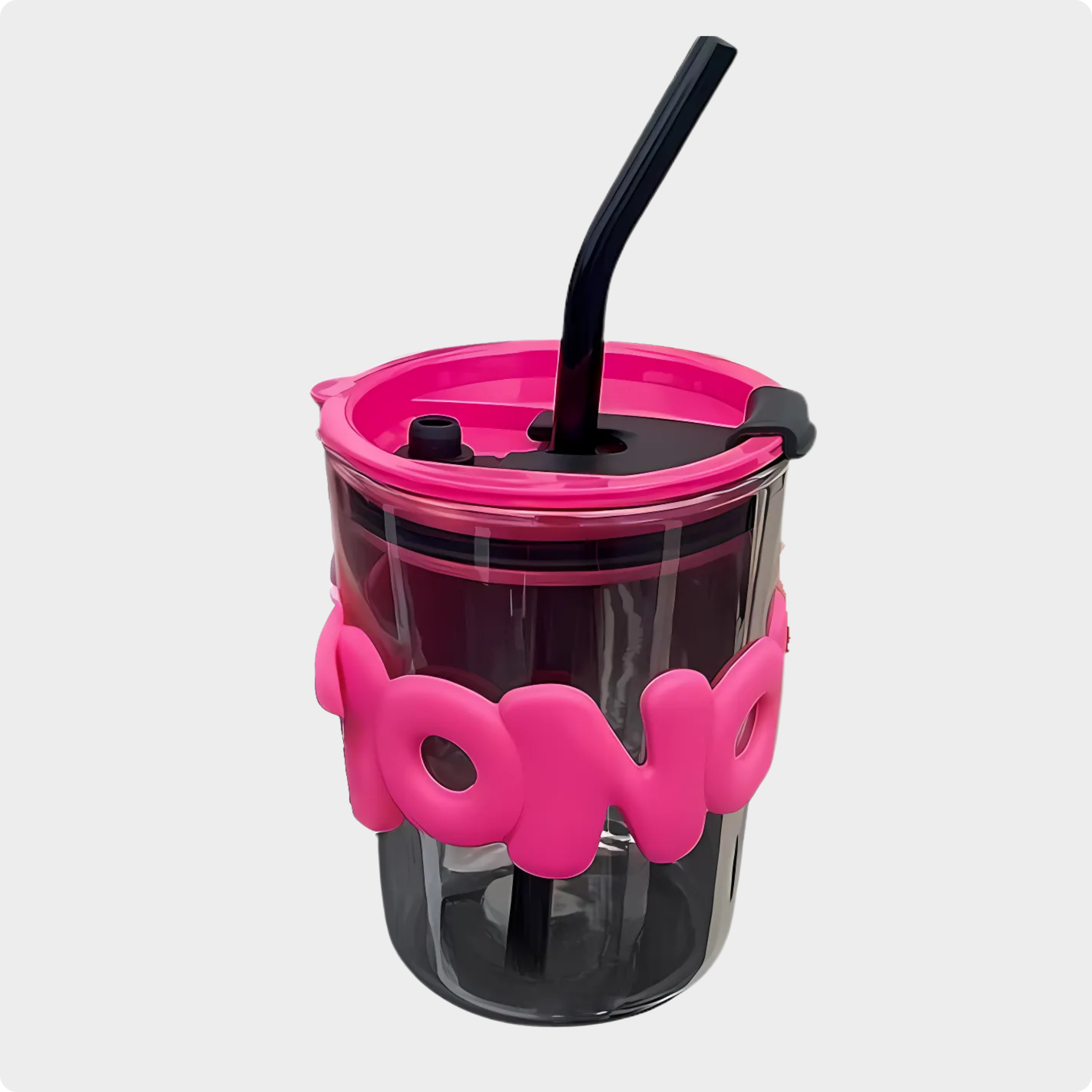 Clear tumbler with pink lid and pink 'POK' grip on a white background
