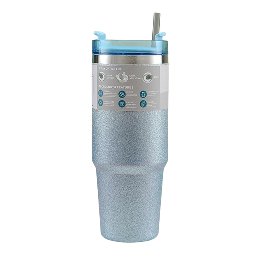 Silver glittery tumbler with a straw on a white background